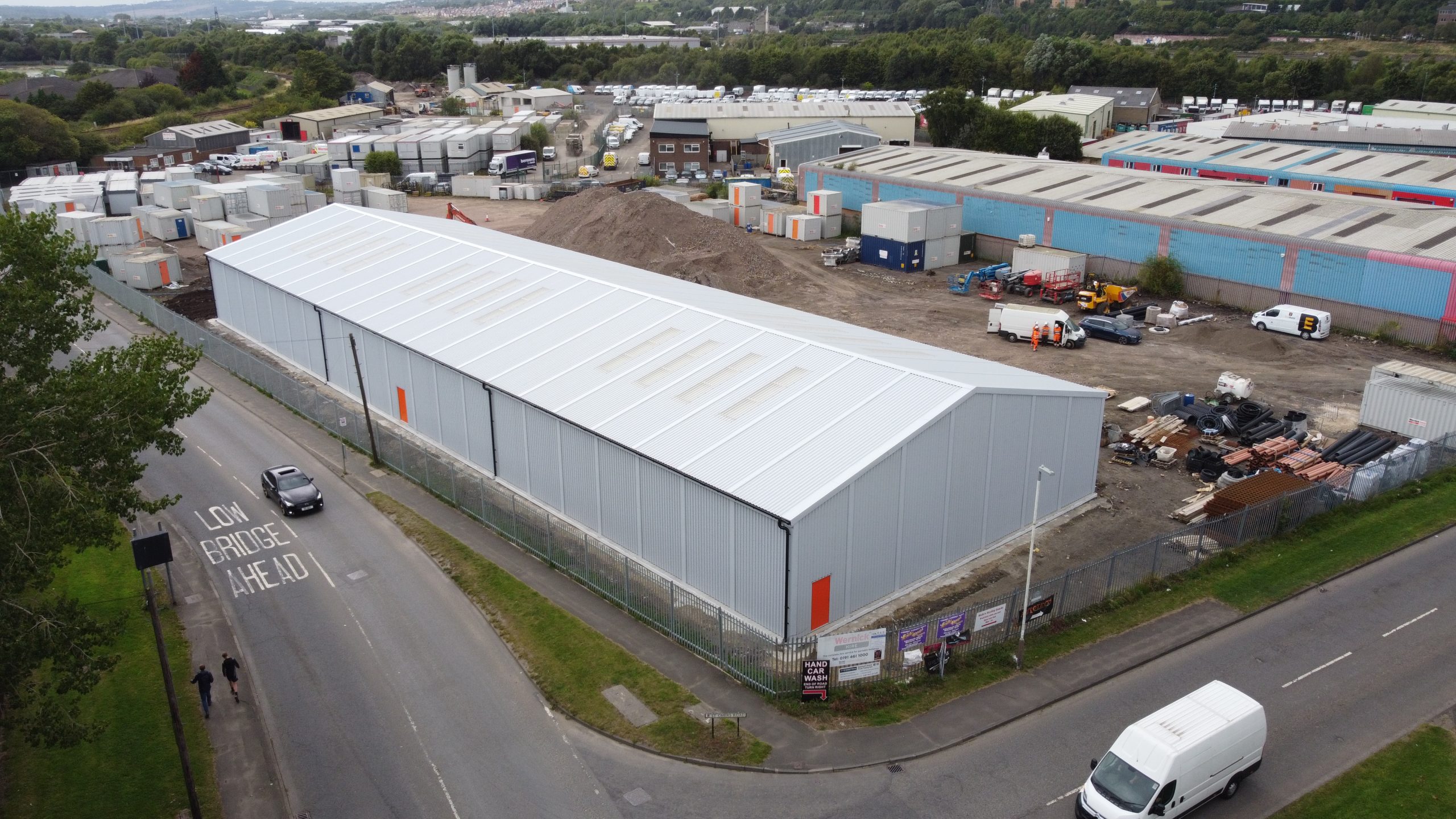 Large steel industrial warehouse with multiple loading bays in Gateshead, manufactured by Saredon Steel Buildings Ltd.
